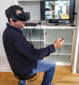 Darius Lahoutifard playing Real Estate VR with Oculus Rift